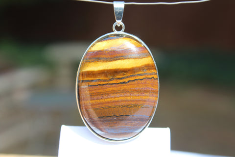 Large Oval Tiger's Eye Pendant - Amazon Imports, Inc. - Fine Quality Gemstones and Jewelry Since 1978