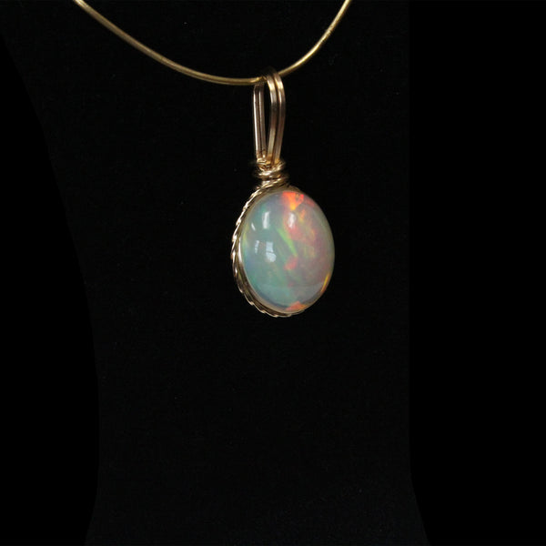 Ethiopian Opal Gemstone Pendant wrapped in 14kt. Gold Filled Wire - Amazon Imports, Inc. - Fine Quality Gemstones and Jewelry Since 1978