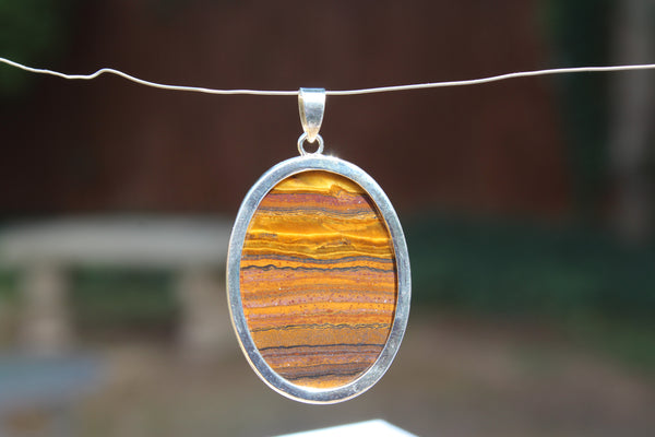 Large Oval Tiger's Eye Pendant - Amazon Imports, Inc. - Fine Quality Gemstones and Jewelry Since 1978