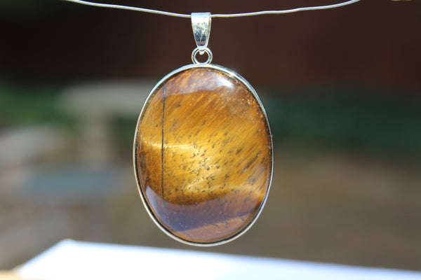 Large Oval Tiger's Eye Pendant - Amazon Imports, Inc. - Fine Quality Gemstones and Jewelry Since 1978