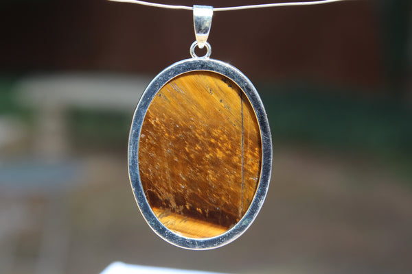 Large Oval Tiger's Eye Pendant - Amazon Imports, Inc. - Fine Quality Gemstones and Jewelry Since 1978