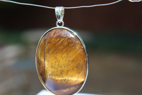 Large Oval Tiger's Eye Pendant - Amazon Imports, Inc. - Fine Quality Gemstones and Jewelry Since 1978