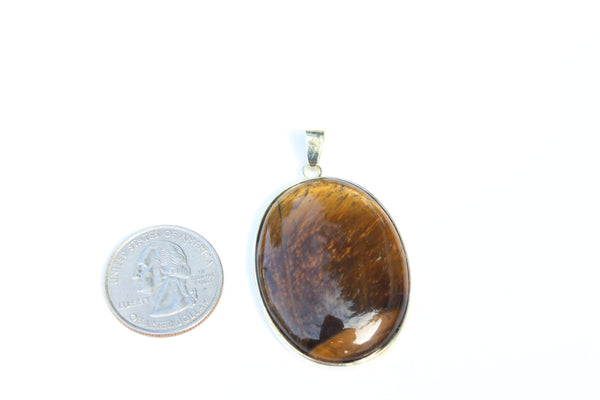 Large Oval Tiger's Eye Pendant - Amazon Imports, Inc. - Fine Quality Gemstones and Jewelry Since 1978